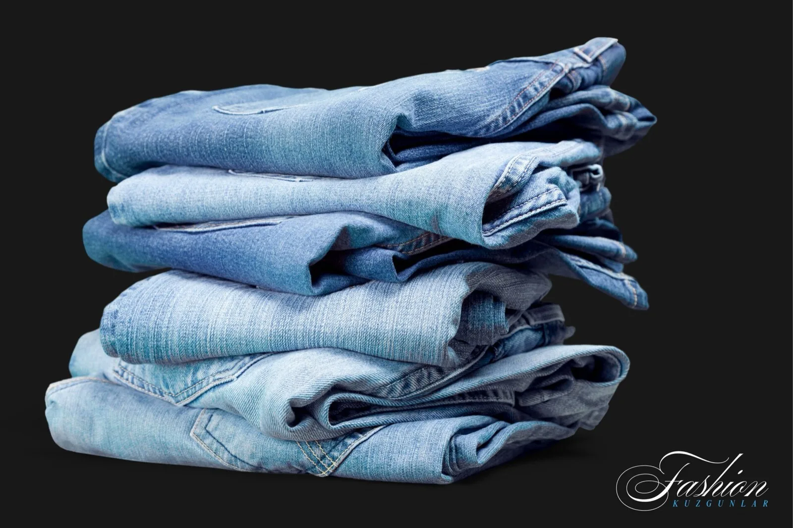 Stack of folded light-wash jeans